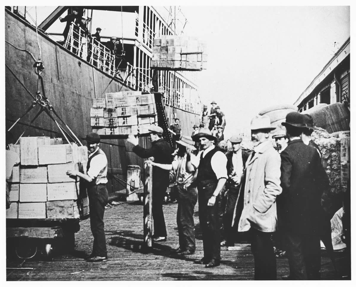 Apple boxes being loaded on the Hobart waterfront c1940s
